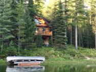 Log Cabin On Spoon Lake Near Glacier National Park
