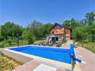 Nice Home In Kapela With Outdoor Swimming Pool, Wifi And 2 Bedrooms