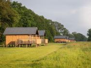 Composite Lodges With Shared Space, Located In The Natural Drenthe